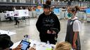 Volunteer poll workers assist with the setup, opening, and closing of a polling place.