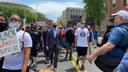 Gov. Tom Wolf marches with demonstrators in Harrisburg on June 3, 2020.