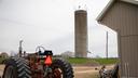 Radios and a microwave dish, installed on top of a farm silo, provide internet service to nearby homes.