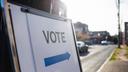 A street sign showing people where to vote in Pennsylvania for 2022 election.