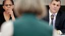 Pennsylvania lawmakers Morgan Cephas (left) and Mark Rozzi (right) listen to a speaker in Philadelphia.