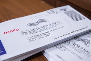 "Naked" ballots are stacked and sorted inside a secure facility within the Erie County Courthouse.