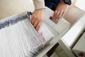 Mail ballots are sorted and counted by workers on Election Day in Northampton County. 